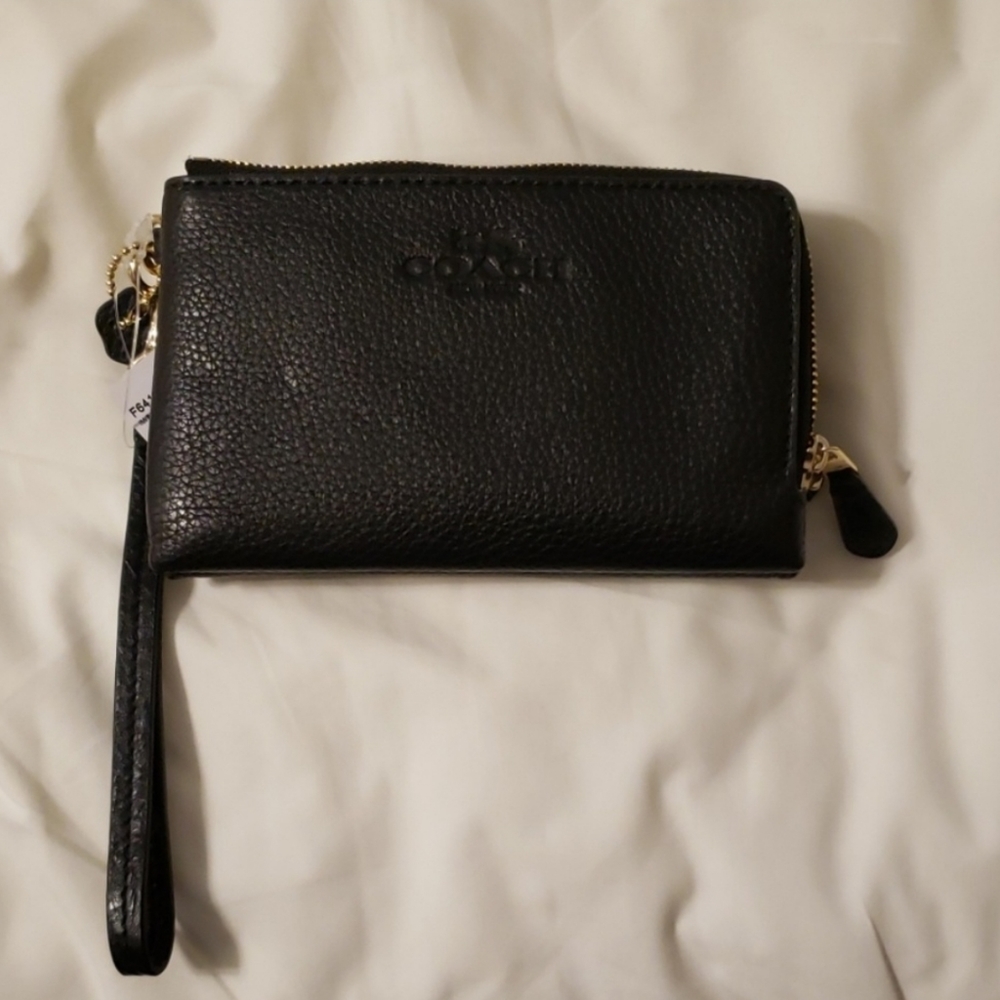 NWT. Coach wristlet wallet.